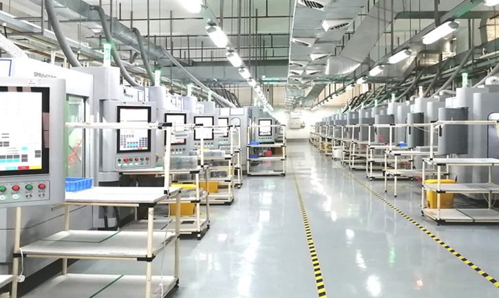 Engineer collaborating on custom CNC plastic part